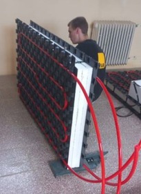 Obr.&nbsp;8a Poh�ad na energeticky multifunk�n� fas�du [Kal�s]